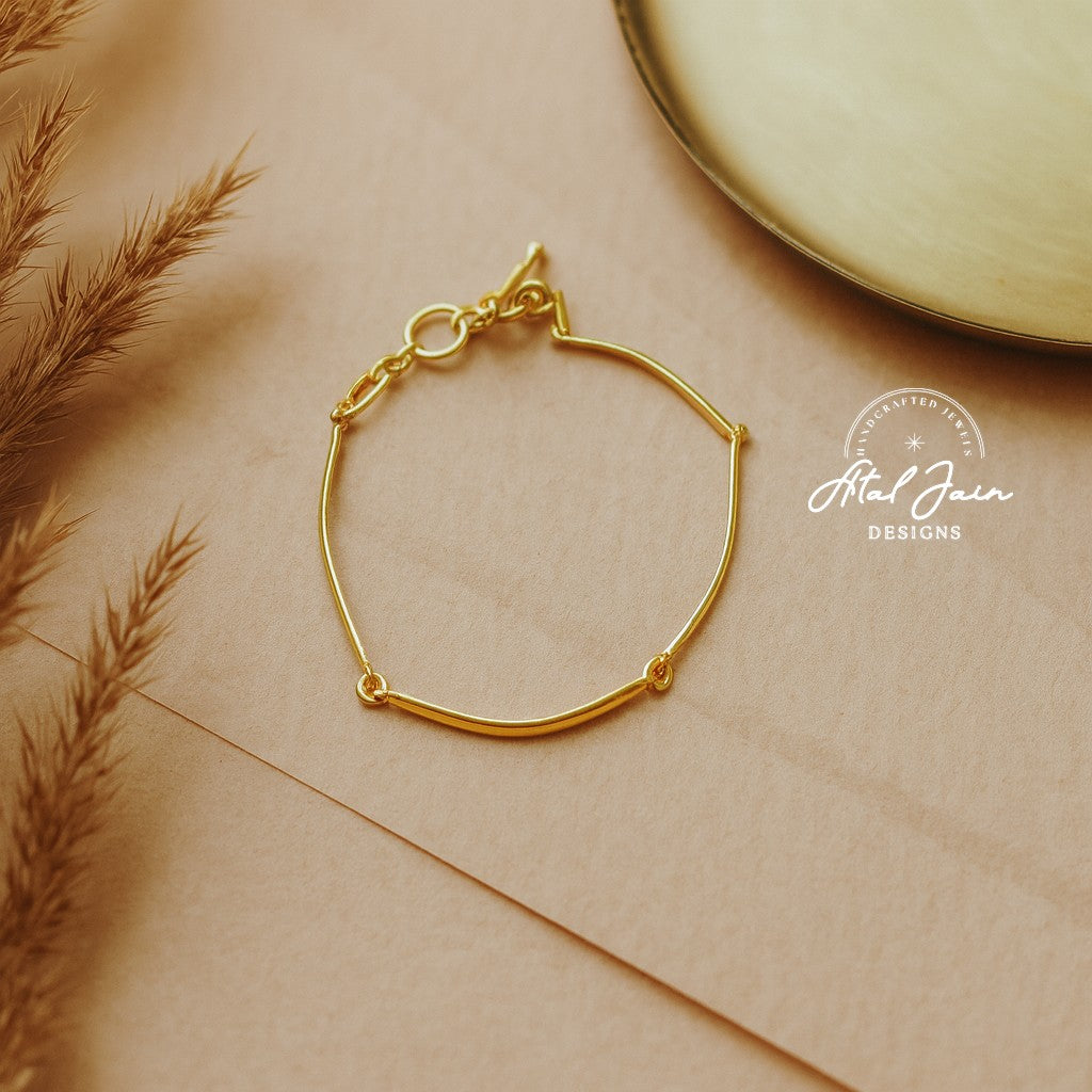 Serene Gold Arc Bracelet