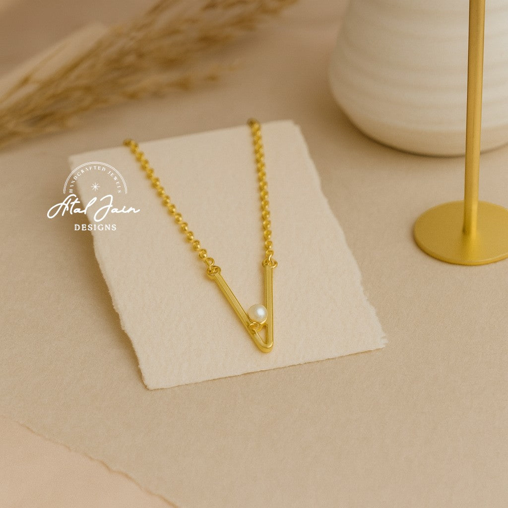 Golden Triangular Allure Pendant with Earrings